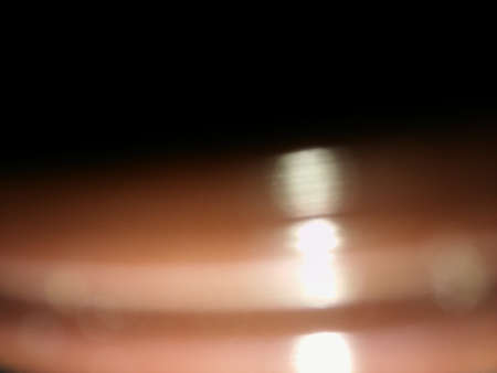 Conceptual brown blur with shiny particles texture with different elements. Background with abstract effectsの写真素材