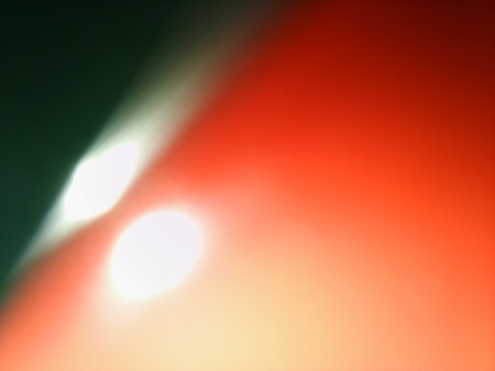Conceptual red blur with shiny particles texture with different elements. Background with abstract effectsの写真素材