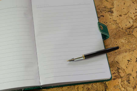 Pen, paper. A textured background. Copy paste placeの写真素材