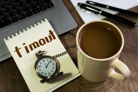 Coffee break! Home office interior in loft space. Workplace with wooden table, office supplies,...