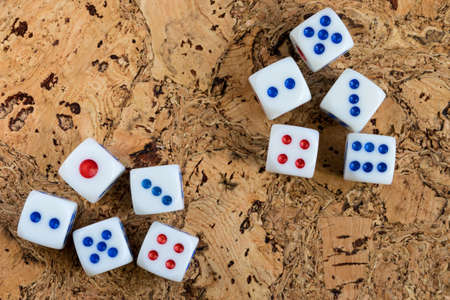 White bones thrown on the table with a brown cork finish