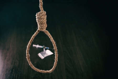 Concept. The noose hanging from the ceiling which are drugs. Copy pasteの写真素材