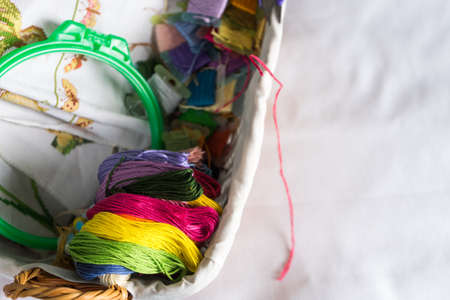 Needlework accessories collection - canvas, hoop, thread mouline. Top view. Copy paste.の写真素材