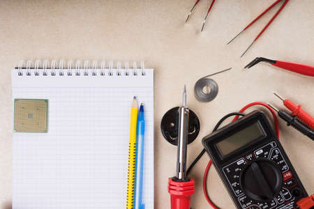 Multimeter, soldering tool and hand tools for electronics assembly