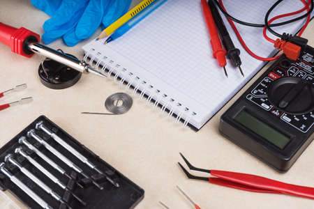 Multimeter, soldering tool and hand tools for electronics assembly.の写真素材