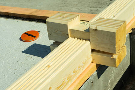 Construction of a wooden house made of profiled laminated veneer lumber.の写真素材