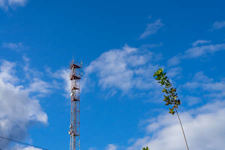 Antenna tower with blue sky and cloud backgroundの写真素材