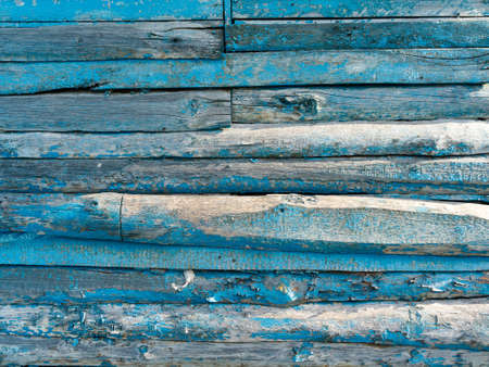 Vintage wood background with peeling blue paint.の写真素材
