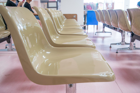 beige chair at waiting zone in hospital.の写真素材
