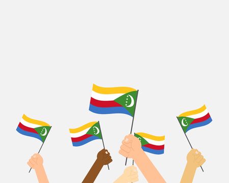 Vector illustration of hands holding Comoros flags isolated on white backgroundのイラスト素材
