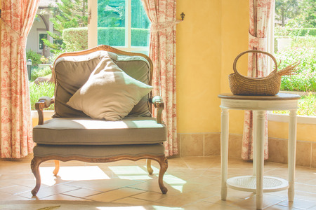 Furniture sofa and desk decorate in hotel lobby lounge.の写真素材