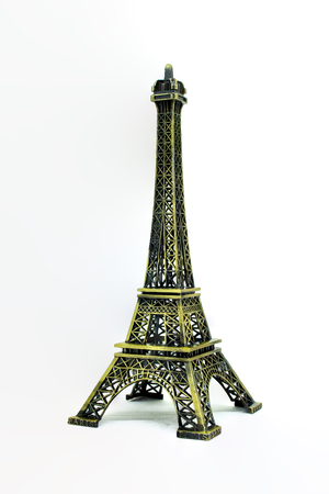 Close up architecture part of Eiffel tower model isolated on white background. (Selective focus)の写真素材