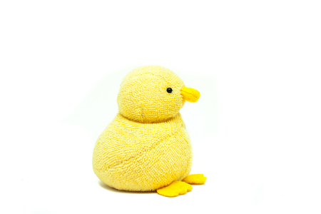 Close up yellow duck doll for kid isolated on white background.の写真素材