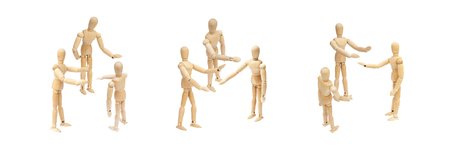 Business Unity and Teamwork Concept : Group of wooden figure mannequin talking and discussion...