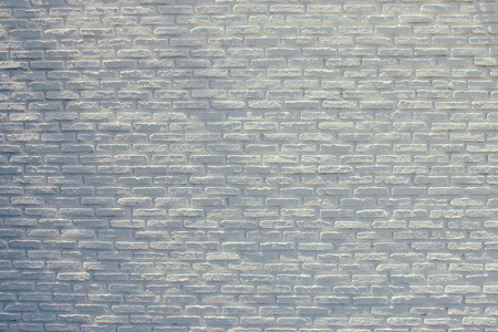 Abstract image of Rustic white grunge brick wall texture background with shadow.