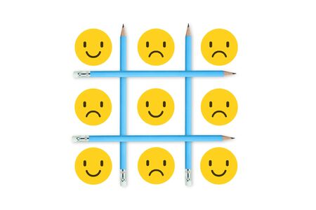 Business Competition Concept : Icon emotions with blue pencils in OX game isolated on white background.の写真素材