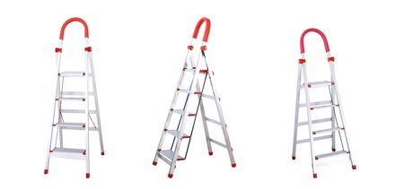 Group of Aluminum folding ladders with hand bar isolated on white background.の写真素材