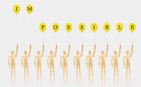 Business Idea Concept : Abstract image of Two wooden figure release balloon and another figures...