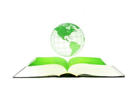 Ecology and Education Concept : Green planet earth globe floating over opened book isolated on white background.の写真素材