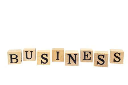 BUSINESS words on wooden block isolated on white background.の写真素材