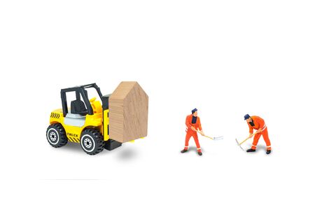 Real State and Architecture Construction Industry Concept : Wooden house on yellow truck building...