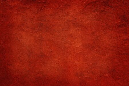 Orange clay wall grunge texture background for interior decoration.