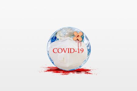 CORONA Virus in Healthcare Concept : Blue planet earth have wounded and wear protective masks. Red blood dripping on earth and falling down on white floor.の写真素材
