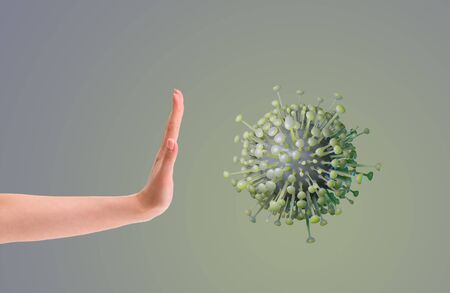 CORONA Virus in Healthcare Concept : Hand making gesture rejection CORONA virus cells symbols or covid-19.の写真素材