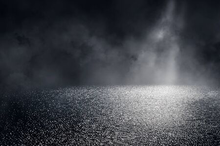 Abstract image of Empty space asphalt street with white smoke in dark light.の写真素材