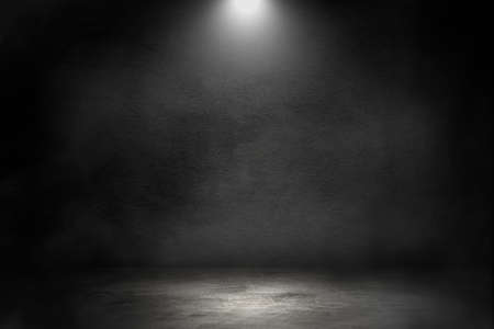 Empty space studio dark room of Concrete floor with spot lighting and smoke in black background.