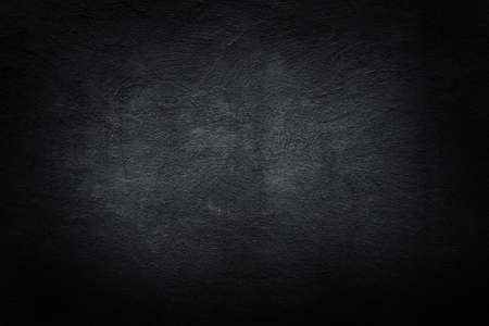 Abstract black clay wall grunge texture background for interior decoration.