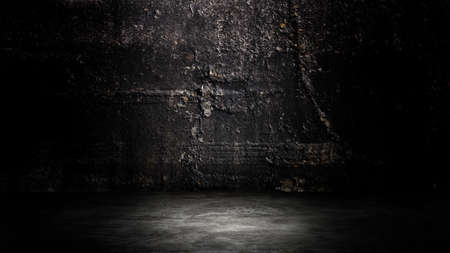 Empty space of Studio dark room with black concrete wall with concrete floor and lighting effect.