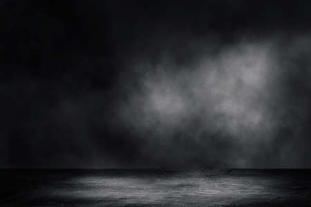 Empty space of Concrete floor grunge texture background with fog or mist and lighting effect.の写真素材