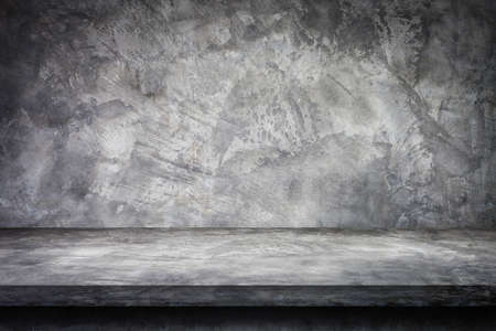 Side view of Gray plaster concrete shelf table top grunge texture background with concrete wall for...