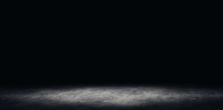 Abstract image of Empty space studio dark room concrete floor grunge texture background.