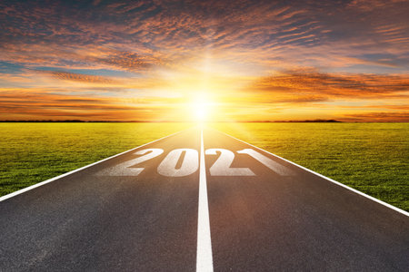 New Year 2021 Concept : Empty asphalt street road and writing text 2021 on roadway.の写真素材