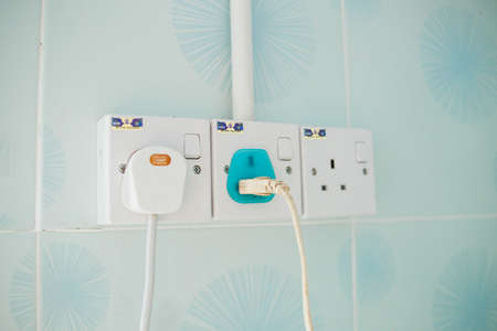 Plug the power plug with connected plugsのeditorial素材