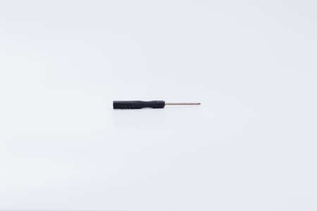 One small screwdrivers isolated on white backgroundの写真素材