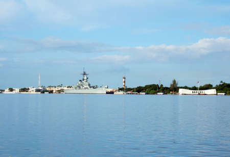 Arizona and Missouri Memorials scene across Pearl Harbor on the island of Oahu in Hawaii.のeditorial素材