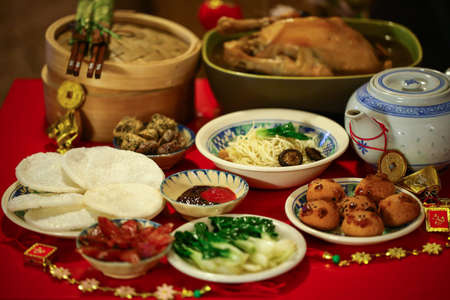 Chinese or Lunar New Year food are served with different kindsの写真素材