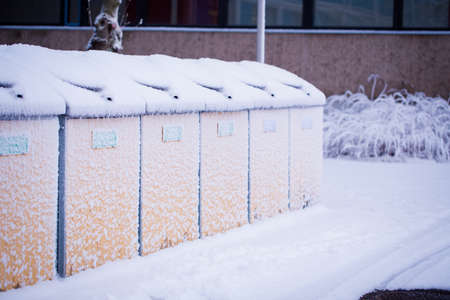 Recycle area is covered by snow in a winter dayの写真素材