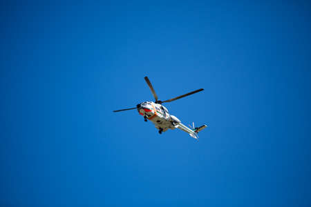 TURKU, FINLAND - MAY 09: Finnish ambulance helicopter in the sky. May 09, 2015 in Turku, Finland.のeditorial素材