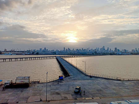 sunset in mumbai city a view from mumbai pierの写真素材
