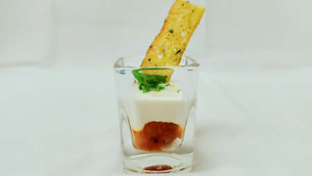 appetizer in a short glass and isolated in white background