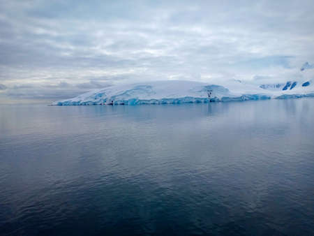 snow covered mountain and glacierの写真素材