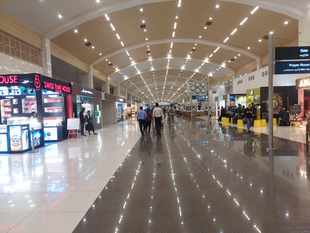 The Cochin International Airport provides a bustling hub for public transport and travel, with its modern architecture and infrastructure housing an indoor shopping mall.の写真素材