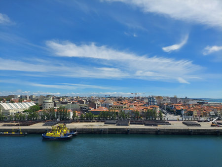 matosinhos portugal A beautiful urban landscape showcasing historic red rooftops and modern buildings against a blue sky. Perfect for depicting urban life, architecture, and cityscapes.の写真素材