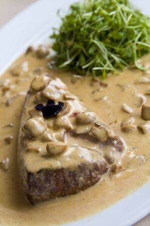 Beef steak in mushroom sauceの写真素材