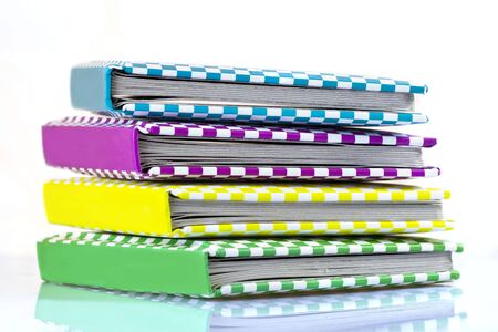 Colorful books on a white background
