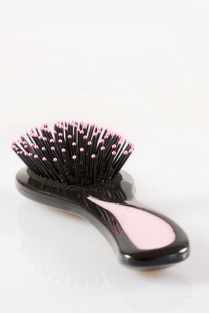 Hairbrush on a white backgroundの写真素材